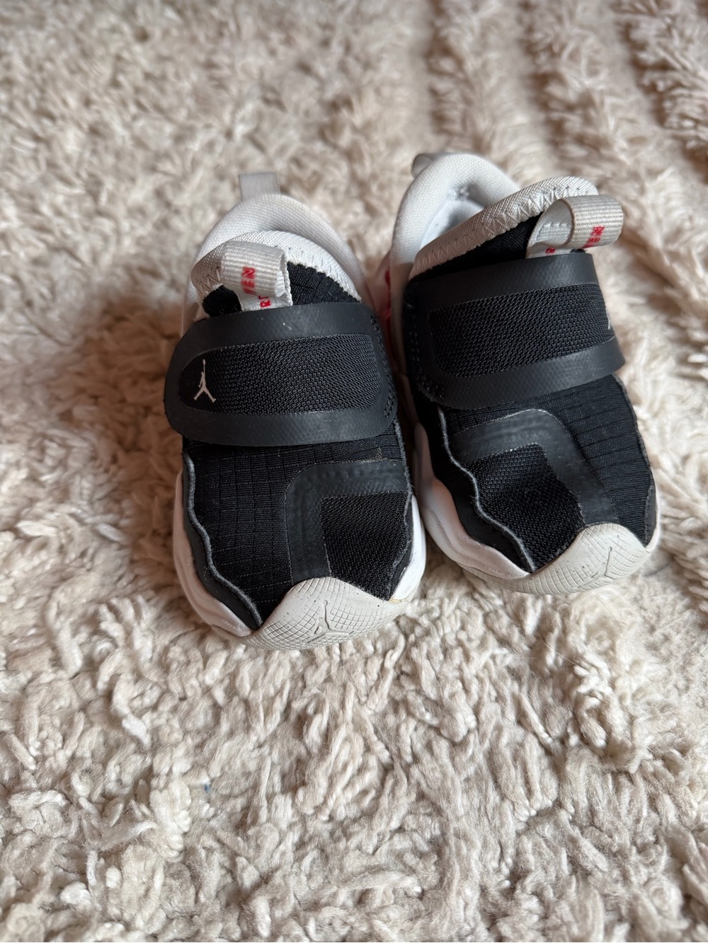 Baby Jordan Black and White Slip-On Sneakers